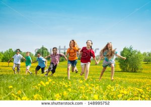 stock-photo-group-of-seven-running-in-the-park-kids-boys-and-girls-black-and-caucasian-148995752